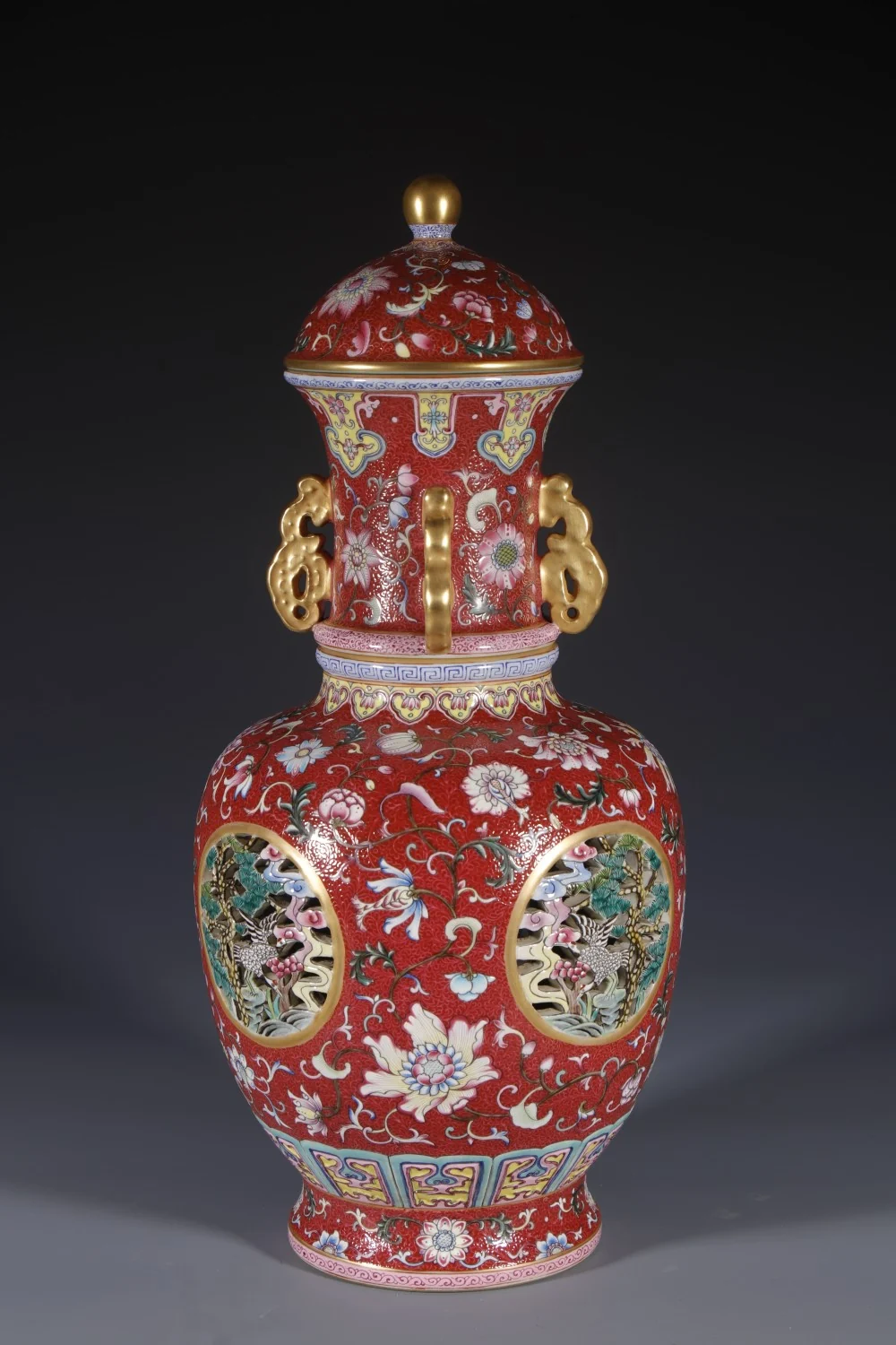 Full view of the famille-rose revolving vase with pierced medallions