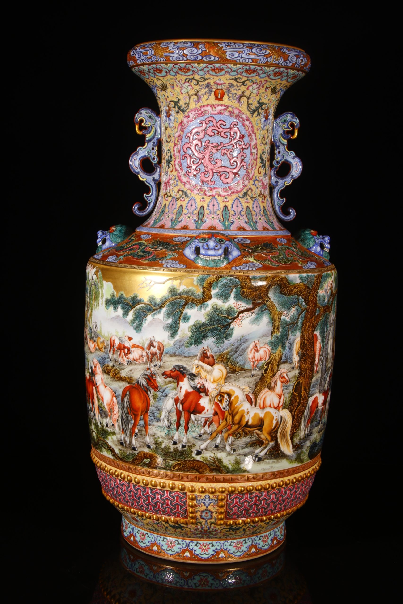 Three-quarter view of the famille-rose vase and dragon handles