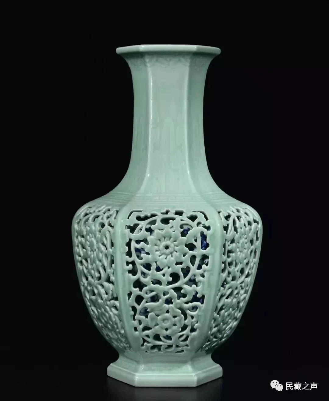 Full view of a pale celadon Chinese openwork double-wall vase